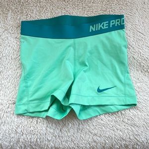 blue/teal Nike Pro running shorts